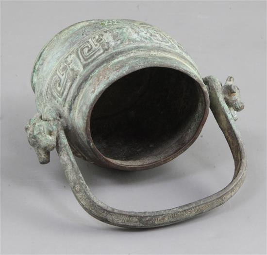 A small Chinese archaic bronze ritual wine vessel, You, Western Zhou dynasty, 10th century B.C., 13cm high, lacking cover
